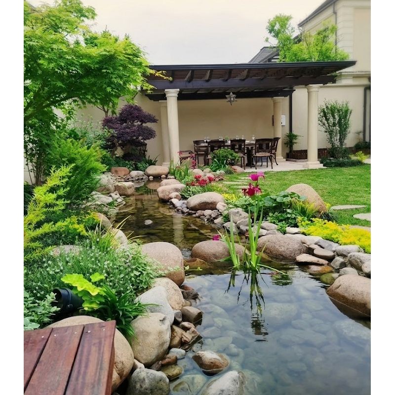 pebble-pond-edging-koi-pond.jpg