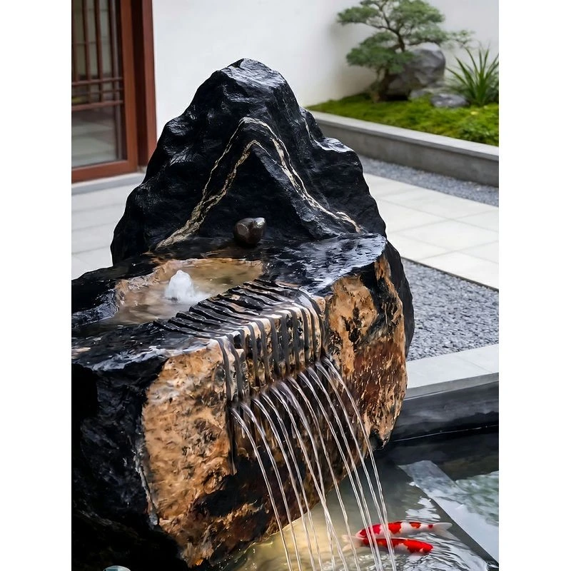 installing-spillway-stones-over-liner.jpg
